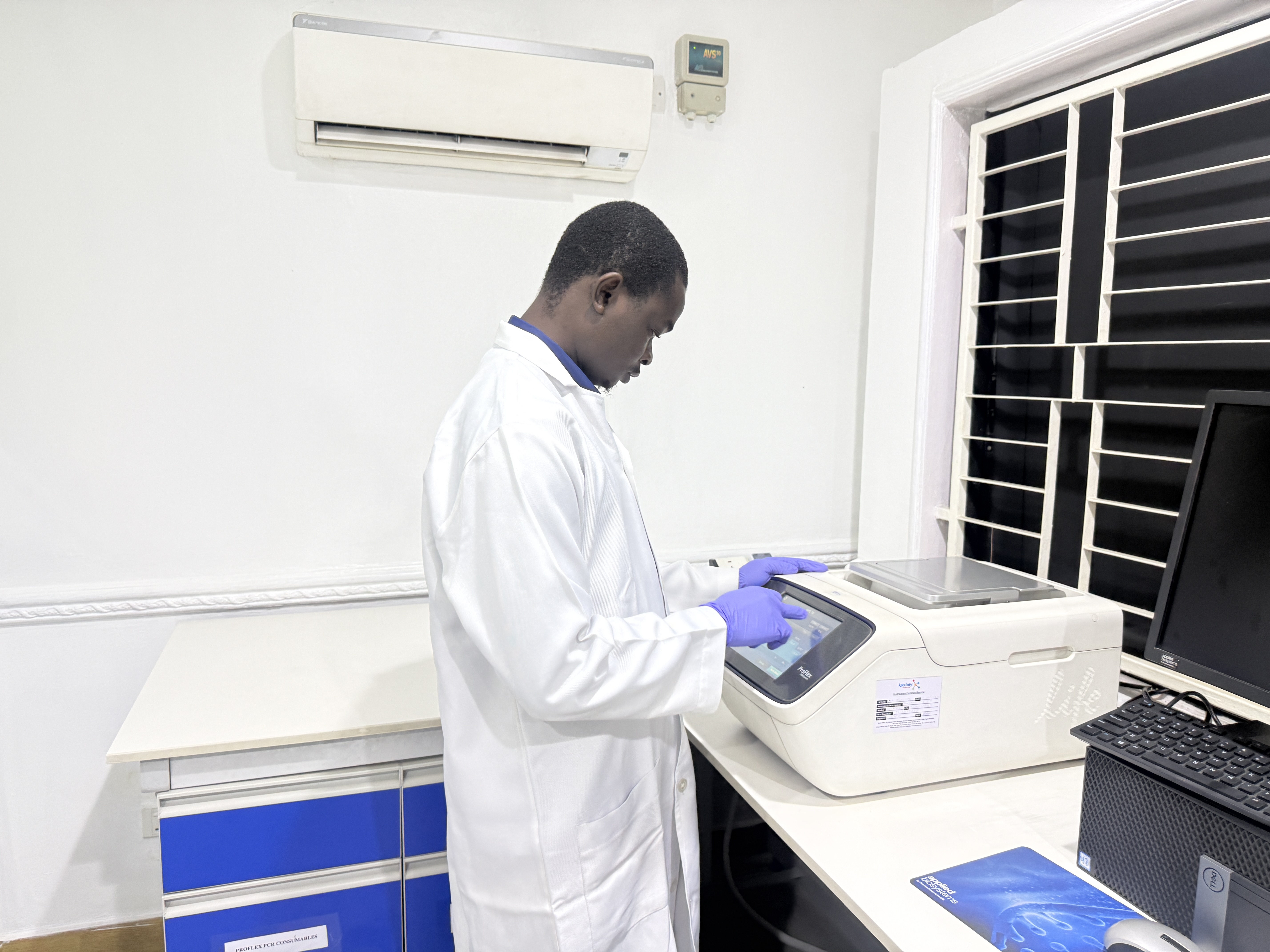 Scientist analyzing a DNA sample in Katchey Genomics & Forensics Laboratory 